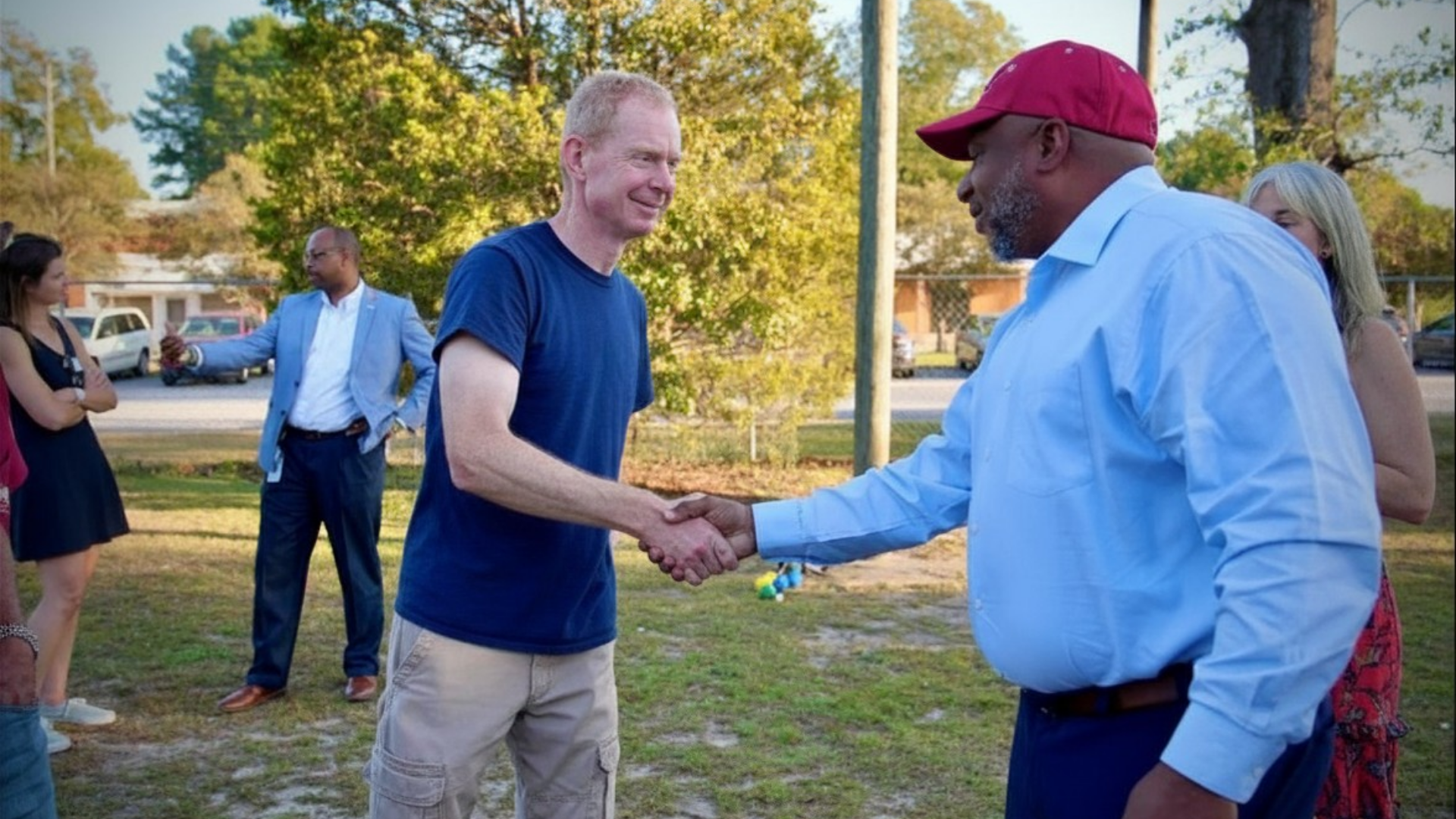 Community Members and program members shaking hands USCP