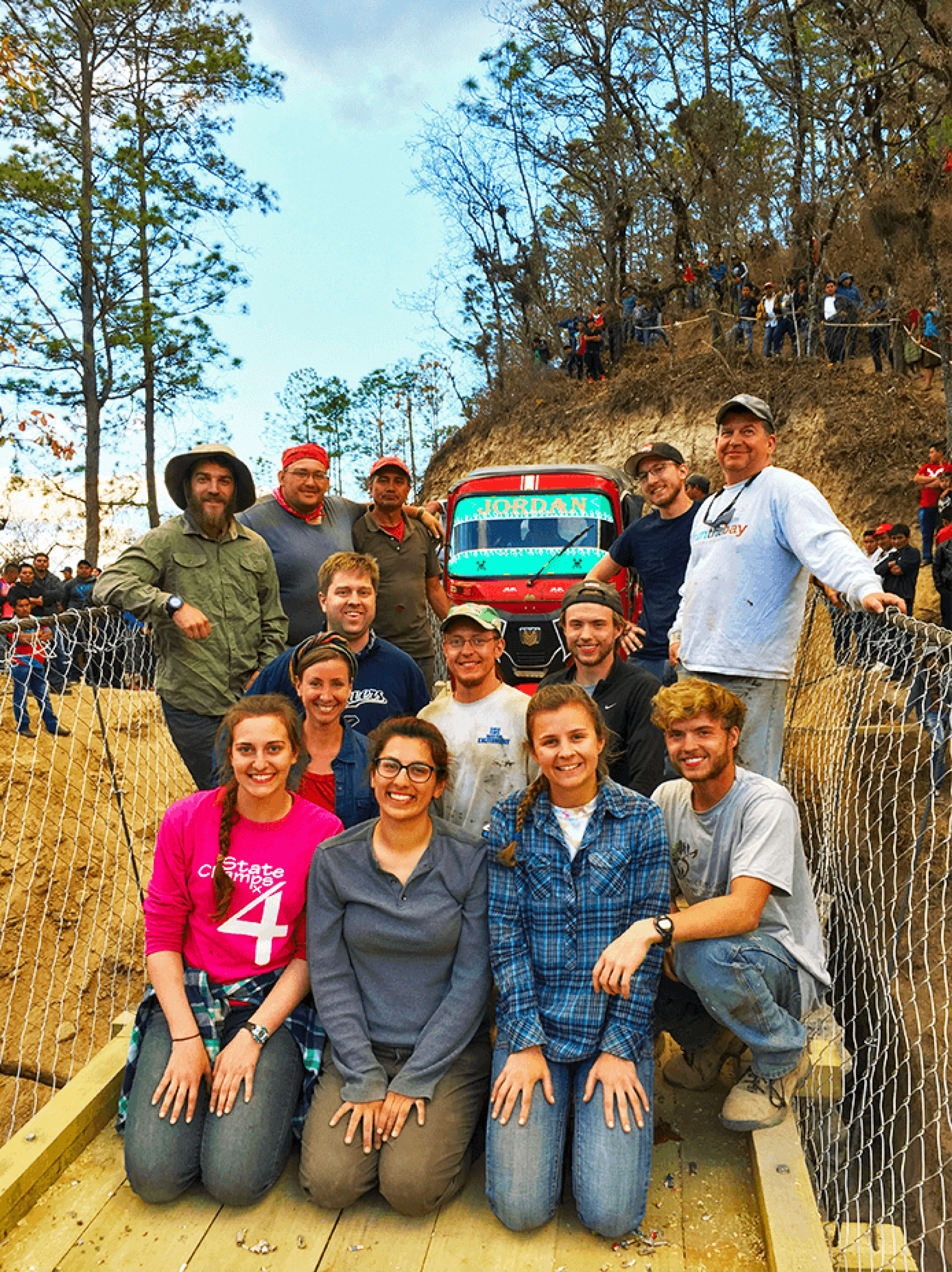 a group of people posing for a photo