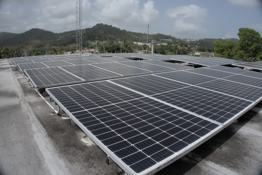 Solar Arrays on the roof of a building in Puerto Rico, installed following massive energy blackouts after Hurrican Maria in partnership between the community engineering corps at EWB-USA and Solar Responders