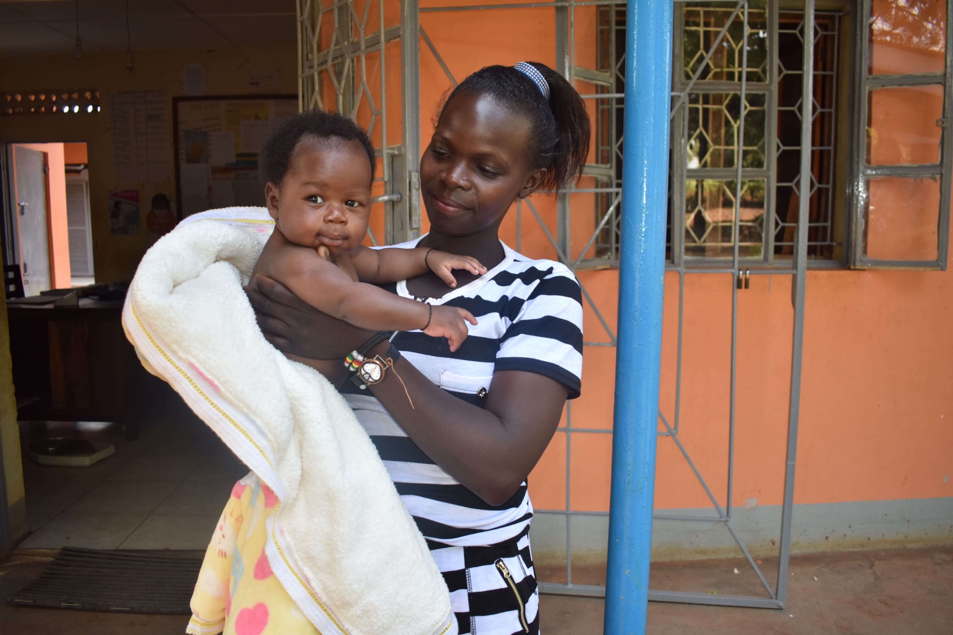 a person holding a baby