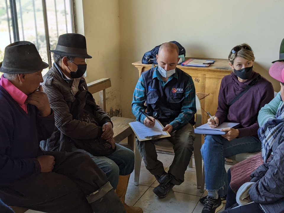 a group of people sitting in a room